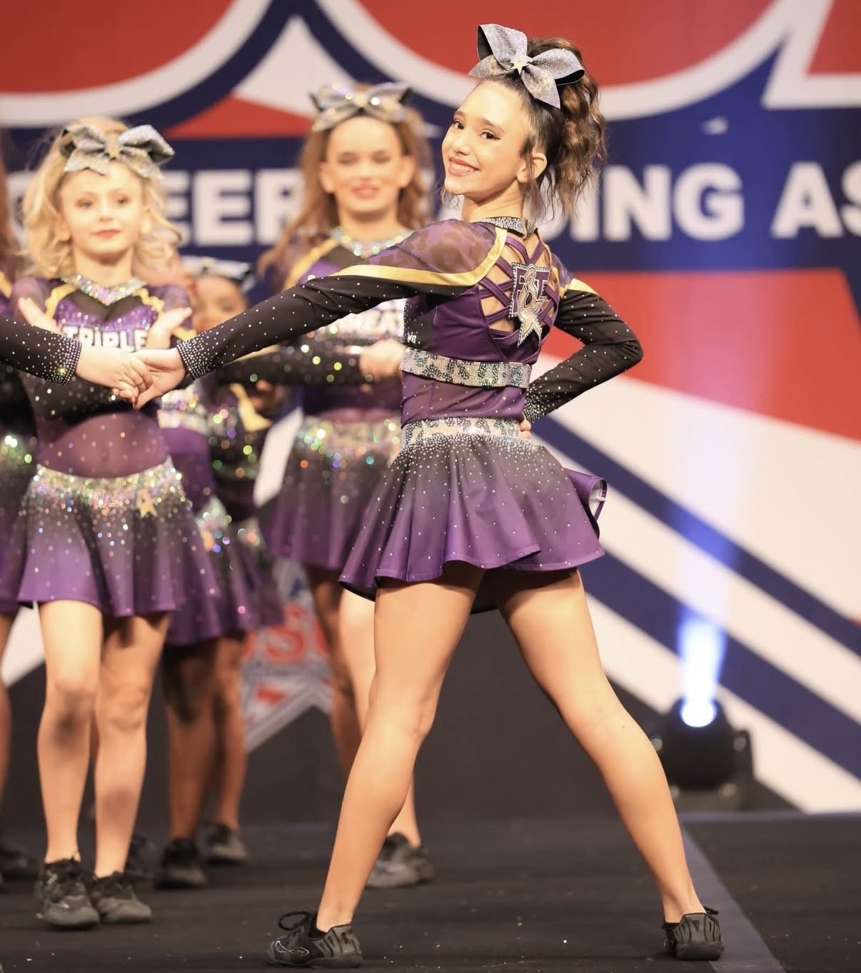 F3T athlete posing on the competition stage